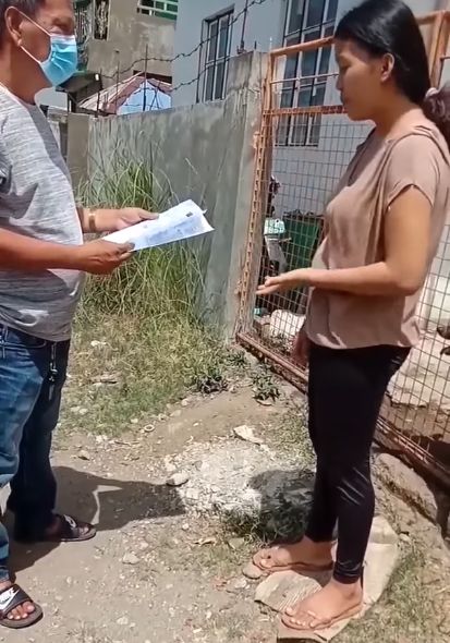 woman complaining about relief goods